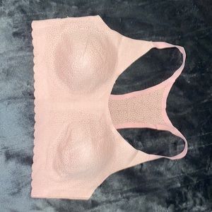 Pastel pink pull over sports bra